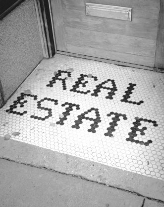 white-and-black-title-that-spells-real-estate